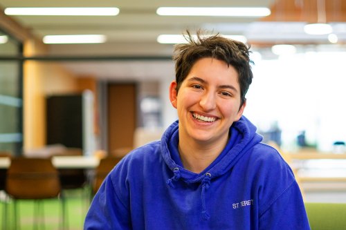 Female student smiling at the camera 