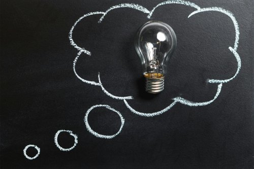 lightbulb on blackboard