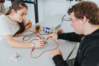 NMITE integrated engineering students working on electrical engineering project